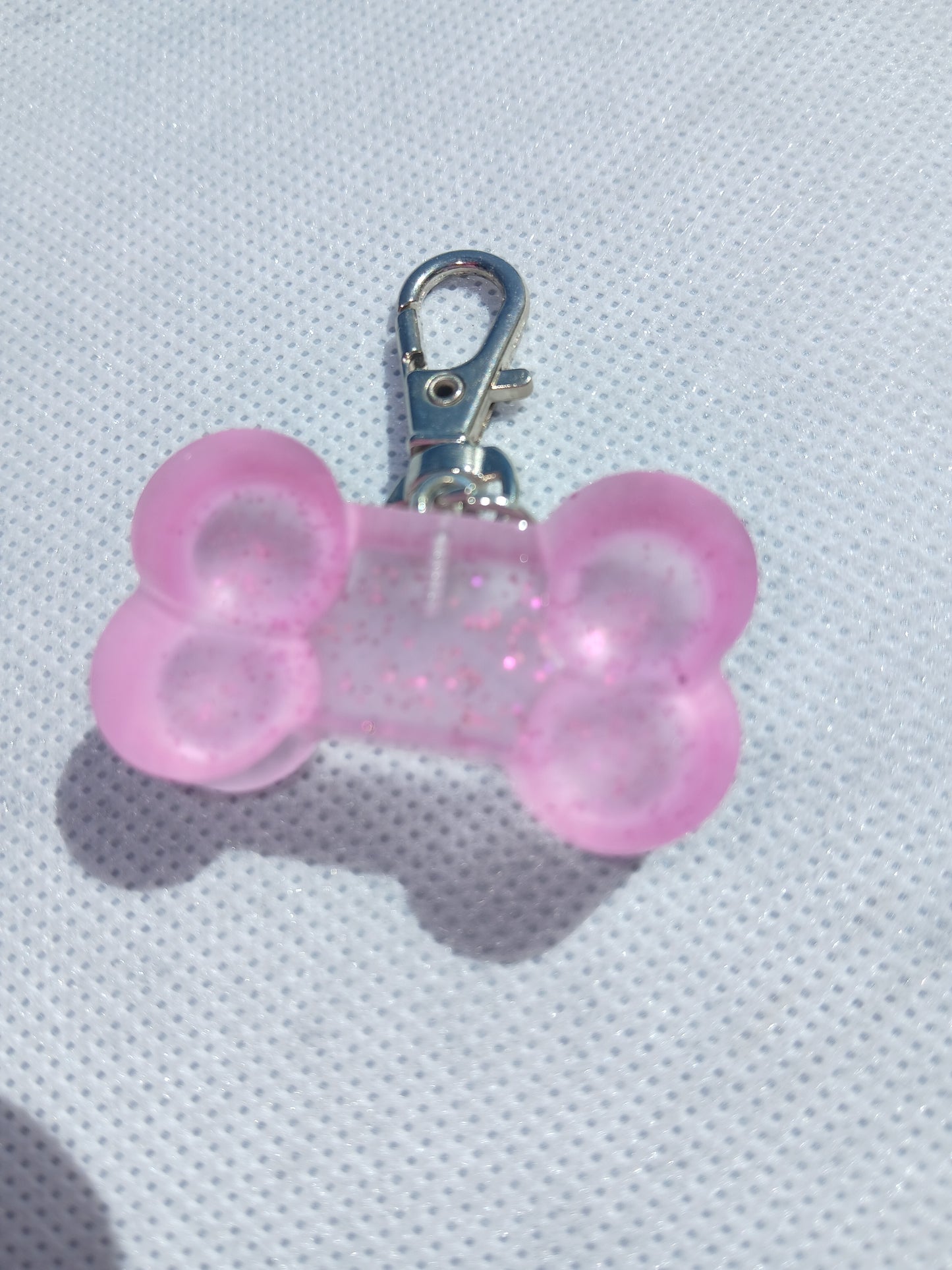 Purple glitter bone keychain